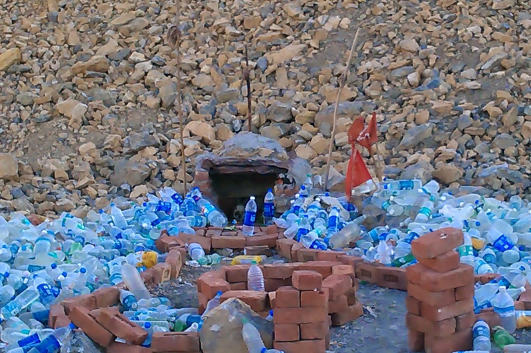 This mysterious temple built in the middle of the hills instead of flower garlands people offer plastic bottles here